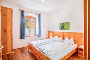Postel nebo postele na pokoji v ubytování Pausahof - Apartment Abendsonne