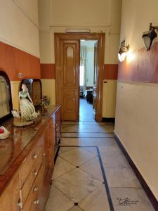a kitchen with a refridgerator and a refrigerator at Clement's House Hostel in Alexandria