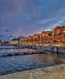 a view of a river with a group of buildings at HOSTAL LETTO DAL MARE in Valencia