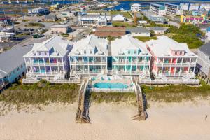 an aerial view of a large house on the beach at Your Turn in Surf City