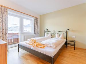 Łóżko lub łóżka w pokoju w obiekcie Vicky Apartment Large