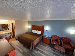 Ένα ή περισσότερα κρεβάτια σε δωμάτιο στο Briarwood Inn