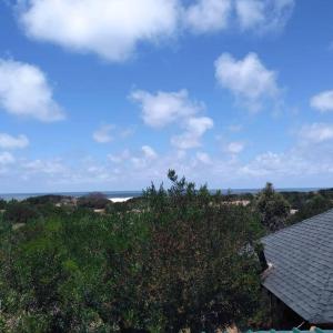 a view of the ocean from a roof of a house at Casita con vista al mar in Salinas