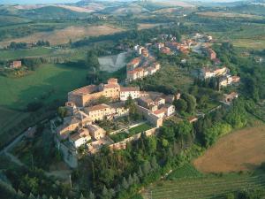 an aerial view of a house on a hill at La Locanda Del Castello in San Giovanni dʼAsso