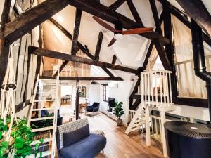 Posedenie v ubytovaní Loft atypique au calme avec cour privative