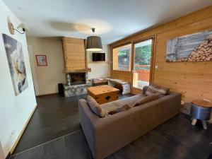 A seating area at Appartement 4 chambres avec grande terrasse