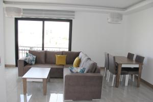 Гостиная зона в Okman Homes