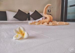 Letto o letti in una camera di Grand Bay Suites