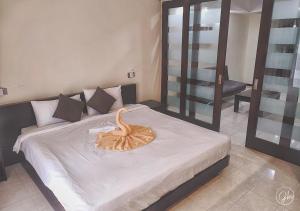 Letto o letti in una camera di Grand Bay Suites