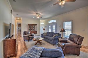 a living room with couches and a tv at Peaceful Bellevue Gem on Working Cattle Ranch in Bellevue
