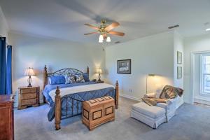 a bedroom with a bed and a ceiling fan at Peaceful Bellevue Gem on Working Cattle Ranch in Bellevue