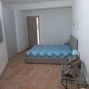 Postel nebo postele na pokoji v ubytování Familyhouse Pevero Hill Porto Cervo