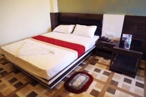 Postel nebo postele na pokoji v ubytování HOTEL PERFECT PLAZA