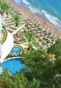 an aerial view of a beach with a pool and umbrellas at Rubi Hotel in Avsallar