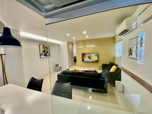 TV in/ali zabaviščno središče v nastanitvi Villa Monica