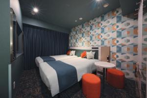 Katil atau katil-katil dalam bilik di Hotel Villa Fontaine Tokyo-Shinjuku