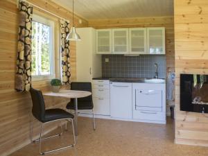 Kuchyň nebo kuchyňský kout v ubytování Hamgården Nature Resort Tiveden