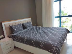 Postel nebo postele na pokoji v ubytování Alanya Crystal Nova apartment