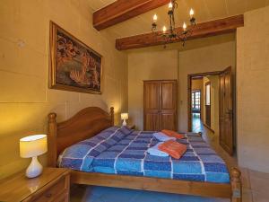 Postel nebo postele na pokoji v ubytování Razzett ta' Leli Holiday Home