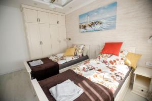 Krevet ili kreveti u jedinici u okviru objekta Apartman MDB RETRO