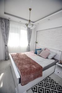 Krevet ili kreveti u jedinici u okviru objekta Apartman MDB RETRO