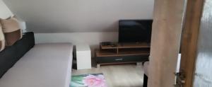 Postel nebo postele na pokoji v ubytování Apartmán DANY Hanušovice