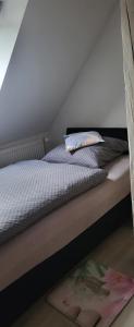 Postel nebo postele na pokoji v ubytování Apartmán DANY Hanušovice