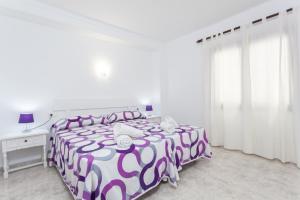 Posteľ alebo postele v izbe v ubytovaní YourHouse Casa Suiza