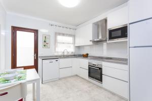 Kuchyňa alebo kuchynka v ubytovaní YourHouse Casa Suiza