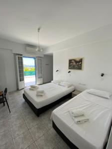 Posteľ alebo postele v izbe v ubytovaní Deep Blue Rooms & Apartments