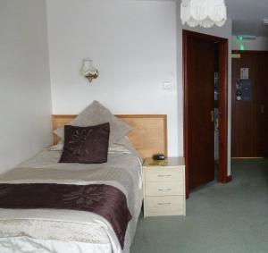 Postel nebo postele na pokoji v ubytování Leys Hotel