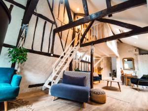 Posedenie v ubytovaní Loft atypique au calme avec cour privative