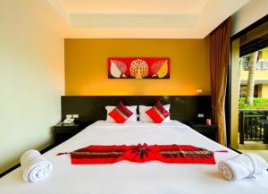Postel nebo postele na pokoji v ubytování Naiyang Beach Hotel SHA Plus
