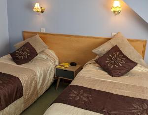 Postel nebo postele na pokoji v ubytování Leys Hotel