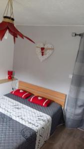 Posteľ alebo postele v izbe v ubytovaní appartement avec balcon au Mont Dore