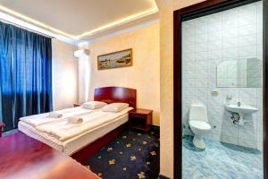 Koupelna v ubytování Hotel Kiev Lomakin + 28 fotografií