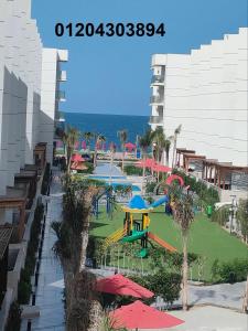 a view of a playground with a water park at Porto Said apartment in Port Said