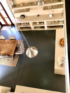 a view from above of a kitchen with a ceiling at Vetho Farmhouse Dullstroom in Dullstroom