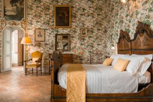 Postel nebo postele na pokoji v ubytování Albergo Real Castello