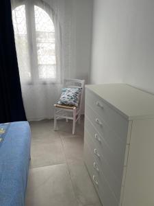 Łóżko lub łóżka w pokoju w obiekcie Duplex RiAnna