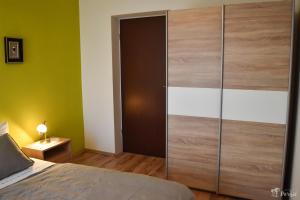 Postel nebo postele na pokoji v ubytování Apartman Peršić