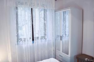 Postel nebo postele na pokoji v ubytování Apartman Peršić