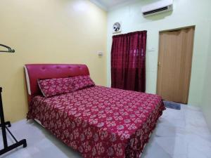 Lova arba lovos apgyvendinimo įstaigoje 5 Bedrooms Ipoh Homestay that can fit 10-12 persons