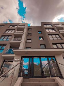 a tall building with stairs in front of it at Apartament Blue BB in Bielsko-Biala +13 photos
