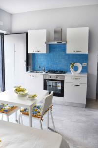 Η κουζίνα ή μικρή κουζίνα στο Studio Apartment Angelo - free private parking