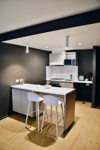 Η κουζίνα ή μικρή κουζίνα στο Seaport Apartments Pacifico H +39 φωτογραφίες