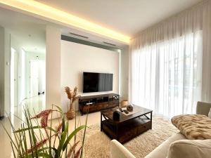TV a/nebo společenská místnost v ubytování Premium Ferienwohnung: Allegra - Alba - Residential