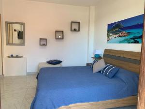 Postel nebo postele na pokoji v ubytování B&B I Colori Dell'Isola