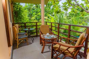 Balkón nebo terasa v ubytování Daisy Cottage Dhangethi