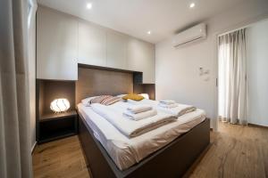 Posteľ alebo postele v izbe v ubytovaní Villas Terraneo